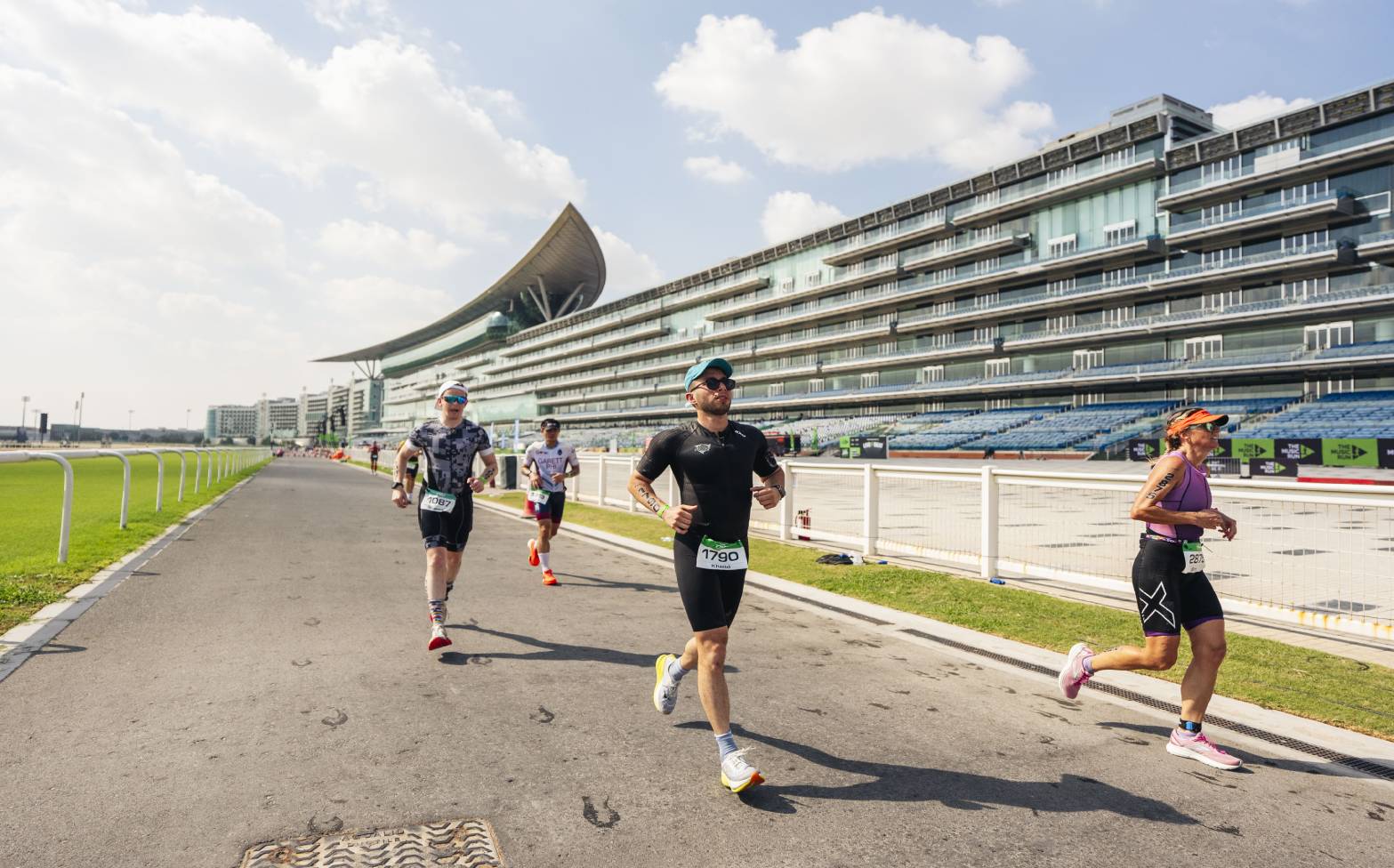 Running along the iconic Meydan Racecourse during the Dubai T100 Triathlon