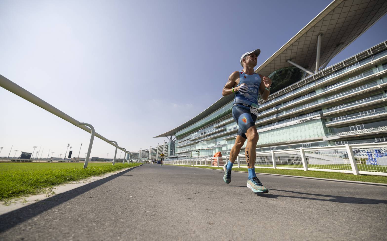 Running along the iconic Meydan Racecourse during the Dubai T100 Triathlon